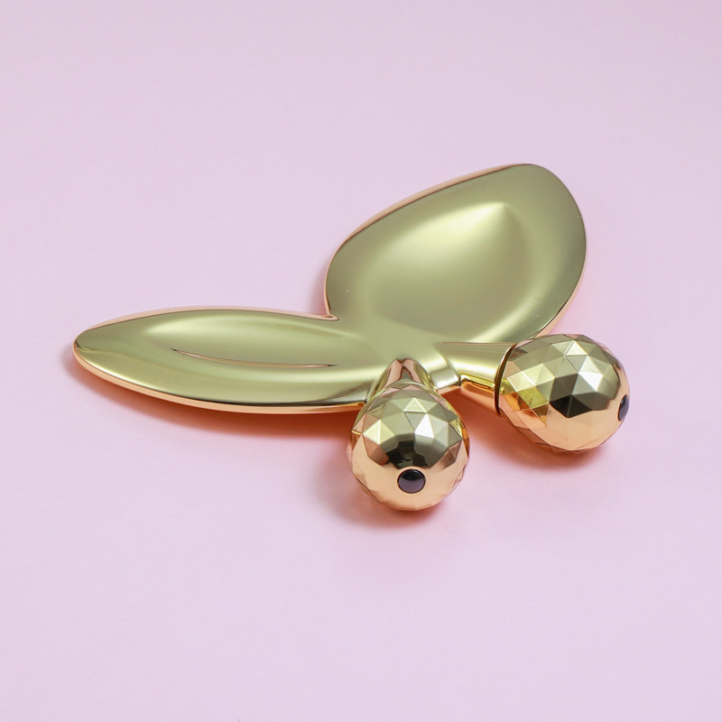 Roller Pijat Wajah Berbentuk Kupu-kupu Paduan Seng Roller Pijat Wajah Berbentuk Kupu-kupu Paduan Seng