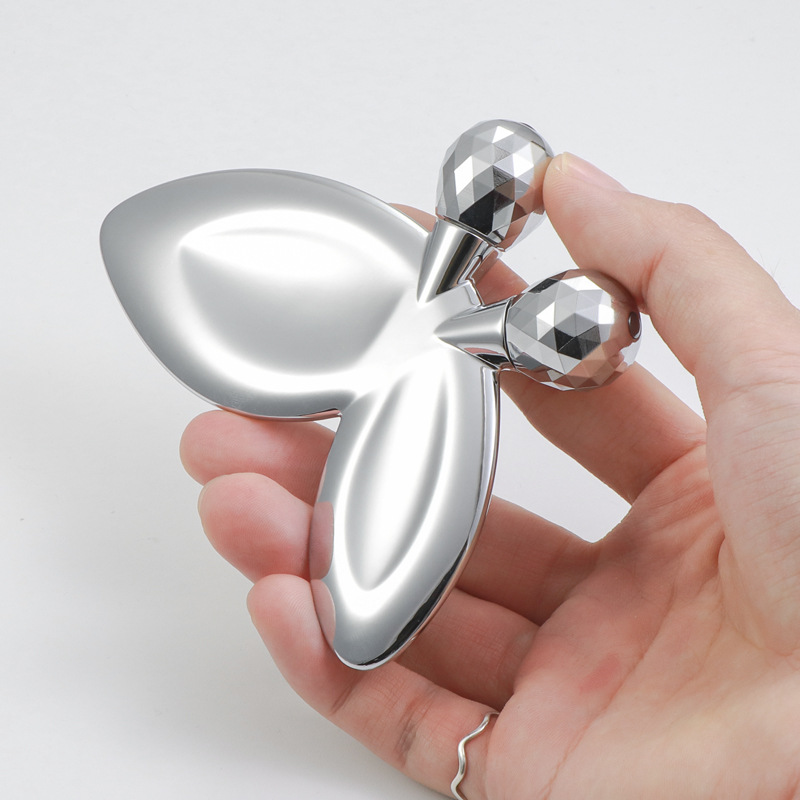 Roller Pijat Wajah Berbentuk Kupu-kupu Paduan Seng Roller Pijat Wajah Berbentuk Kupu-kupu Paduan Seng